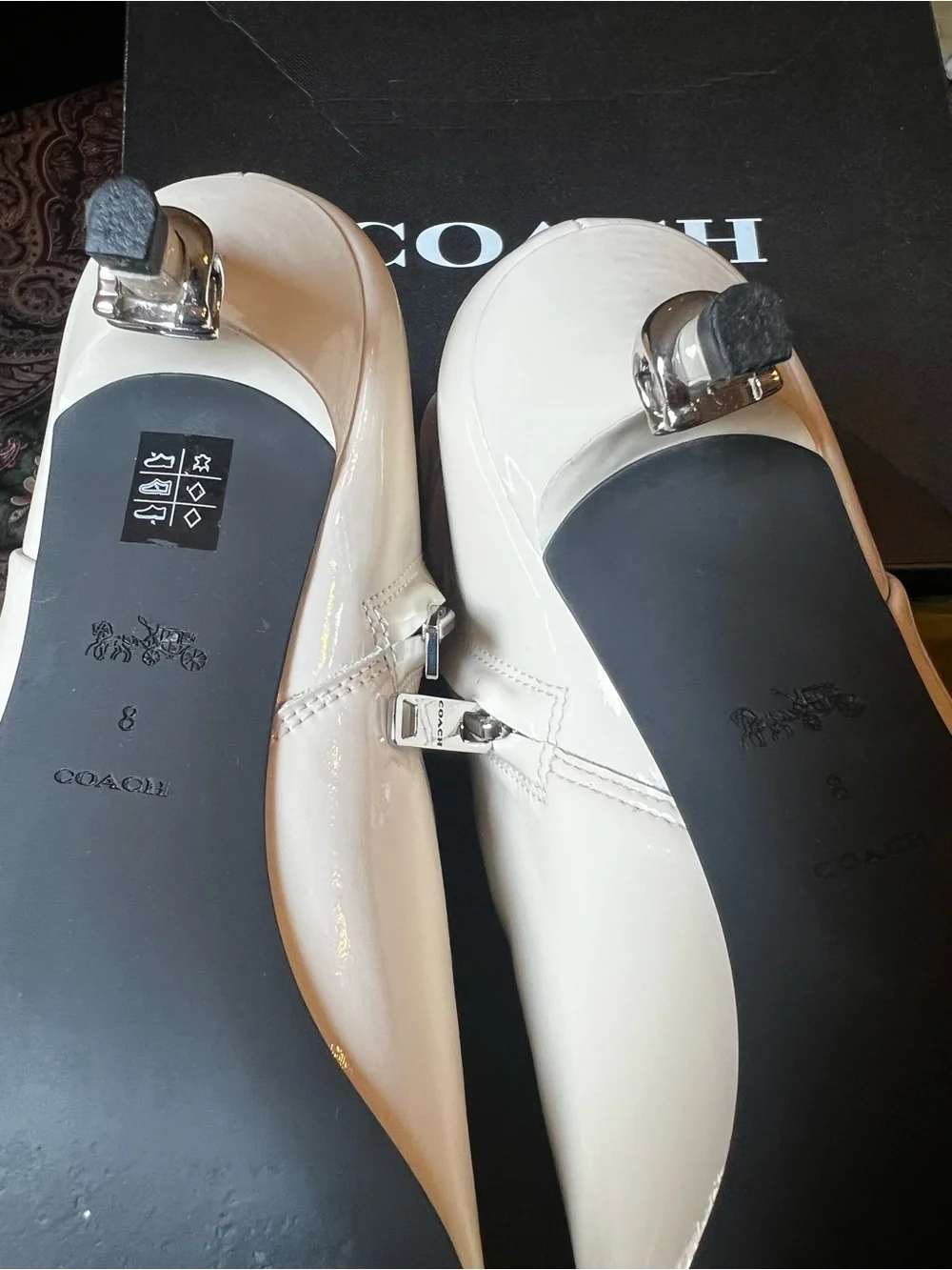 Coach glossy white
